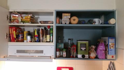 Ambient storage space above my sink and electric cooktop.