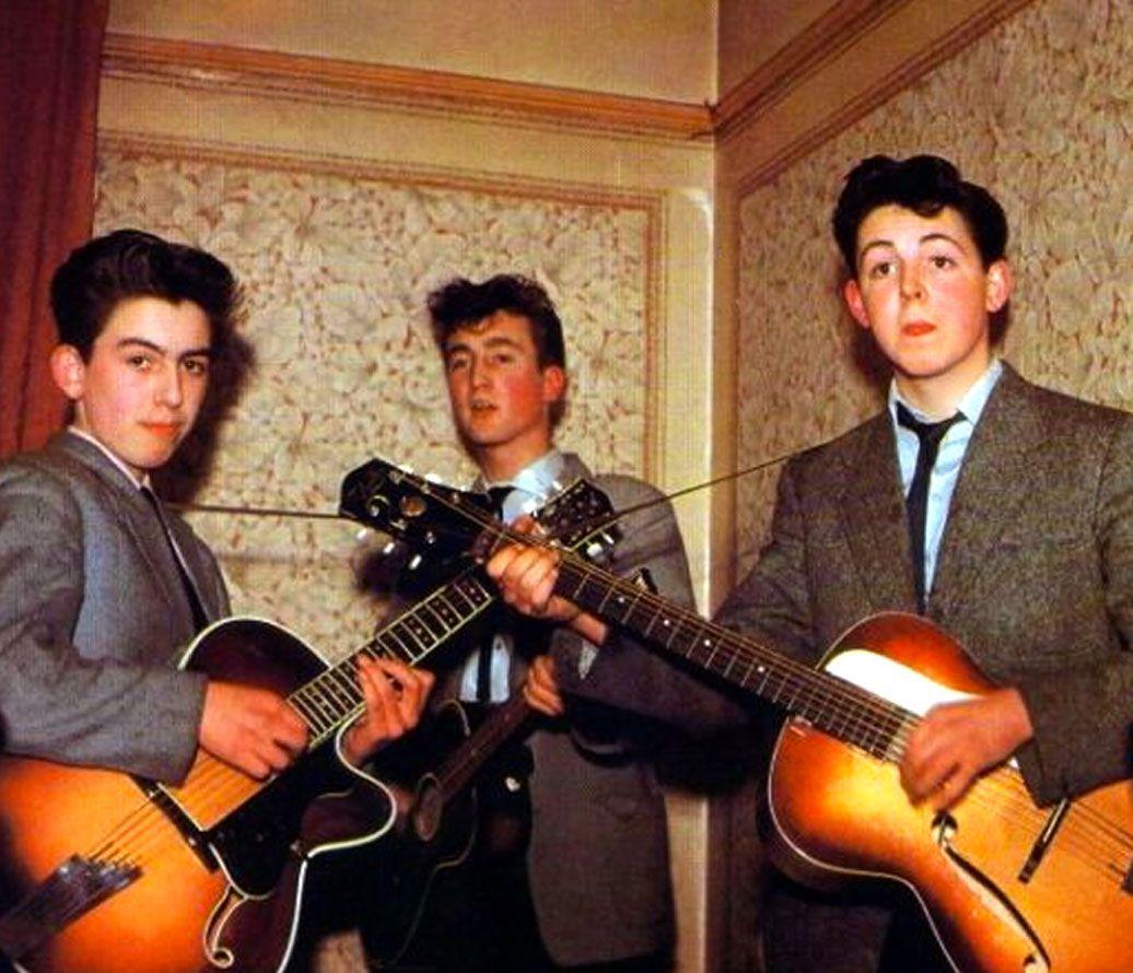 The nascent Beatles in 1957 (George, John, and Paul), in what I presume to be school uniform, with rockabilly quiffs.